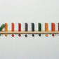 Rainbow Dominoes Chain Reaction Wall Panel by HABA Pro