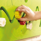 Blooming Meadow Sliding Flowers Wall Activity by HABA Pro