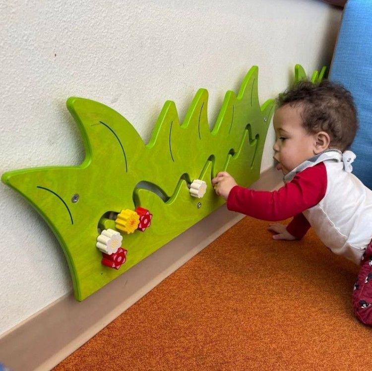 Blooming Meadow Sliding Flowers Wall Activity by HABA Pro